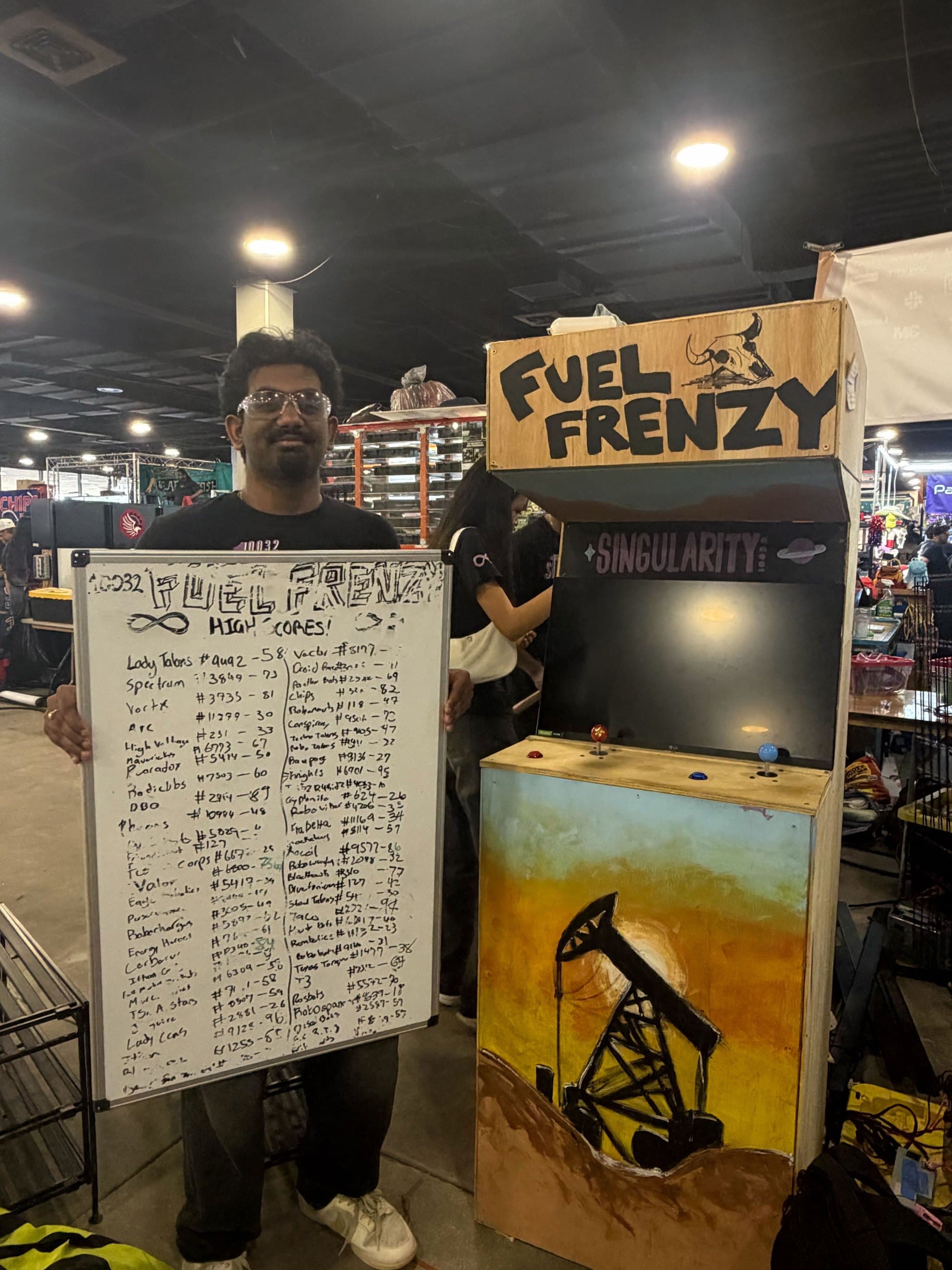 Fuel Frenzy, one of two 8-bit arcade games designed, programmed and built by Singularity students, with the running high-score board the team keeps at community events. Photo: Singularity Robotics, FRC Team 10032